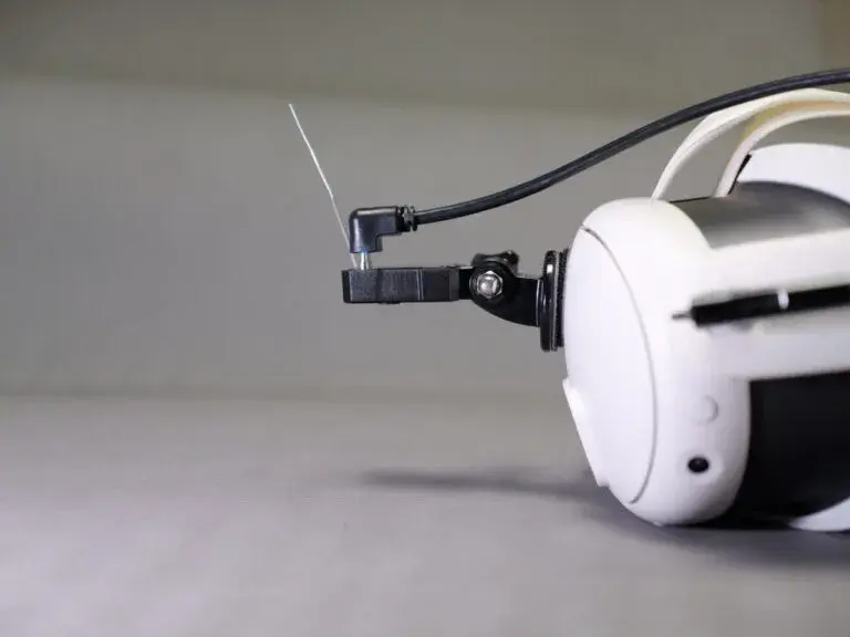 Camera cable plugged into the headset mount; refer to kit power instructions.